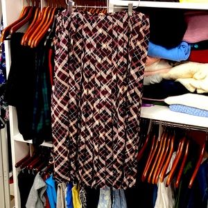 Calvin Klein 12 Plum, Forest, Red, and Cream Plaid Pleated Skirt w/side zipper.